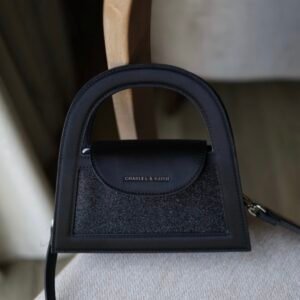 Este glittered top handle bag