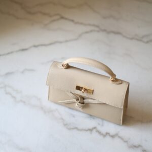Tricha Knotted-Belt Top Handle Bag